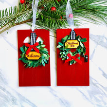 Load image into Gallery viewer, Wooden Red Doors with wreath and door plaque saying Christmas 2021 and Welcome. Both are Christmas Tree Ornaments
